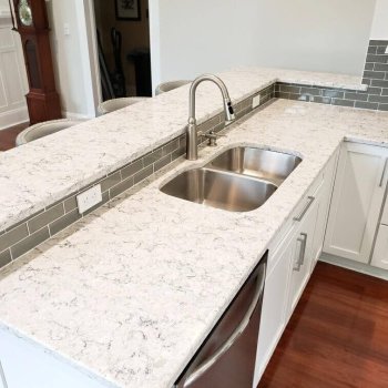 Fresh countertops with undermount kitchen sink and accessible outlets