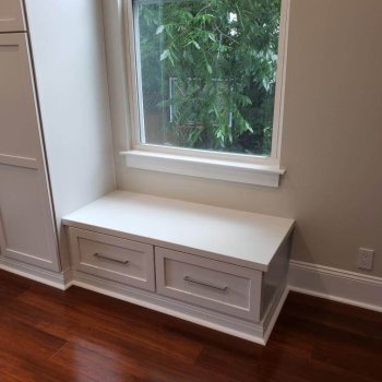 White window seat with drawers